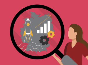 Symbolgrafik: Eine Frau wirft mit einer Lupe einen genaueren Blick auf die Startup-Branche Deutschland